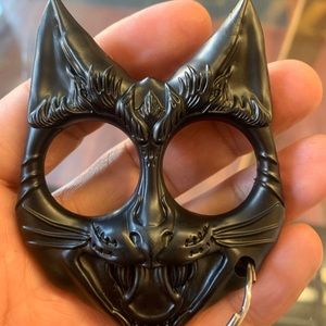 Pink not black keychain Woman self-defense ring